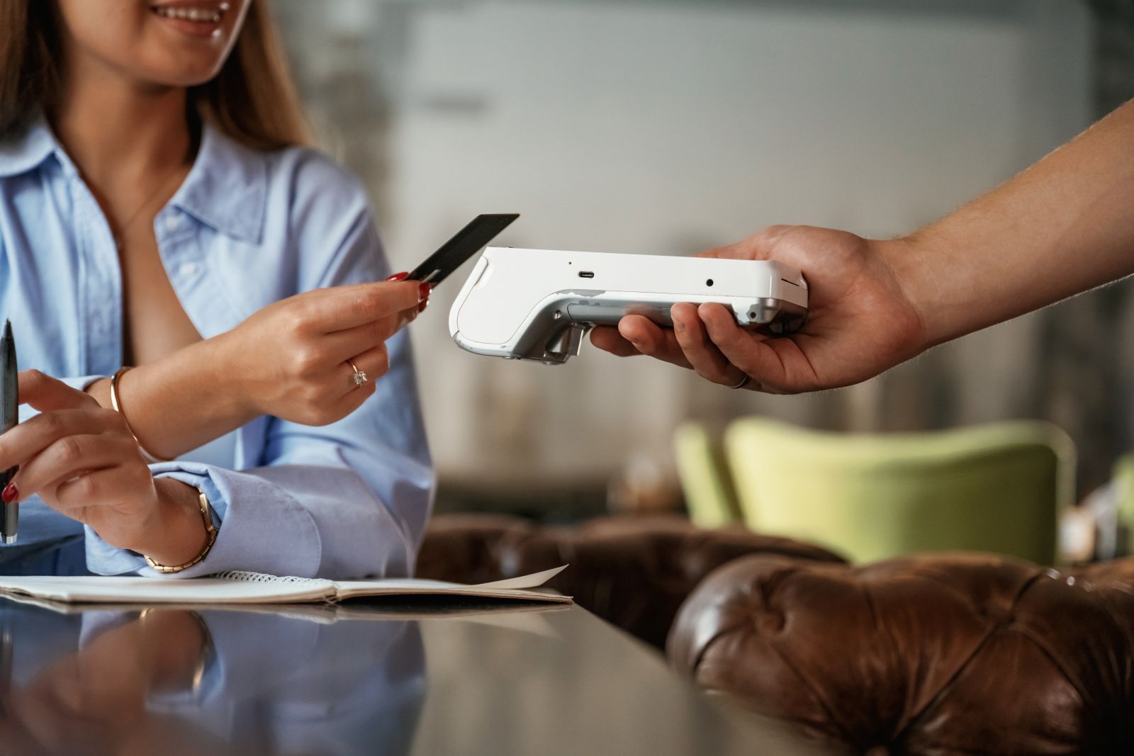 woman holding credit card